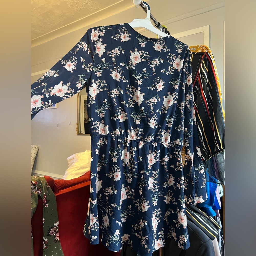 Romper. Floral print. So cute. Size XL. Brand New. Never worn